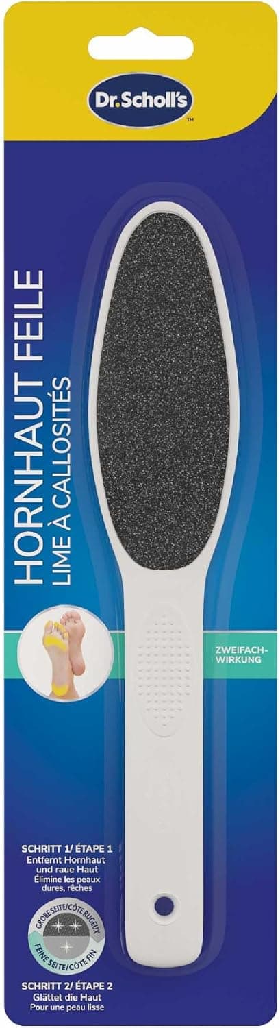 Weiße Fußfeile mit schwarzer Reibefläche in der Blisterpackung, Aufschrift Dr. Scholl's, Hornhaut Feile, Zweifachwirkung, Schritt 1 entfernt Hornhaut und raue Haut, Schritt 2 glättet die Haut