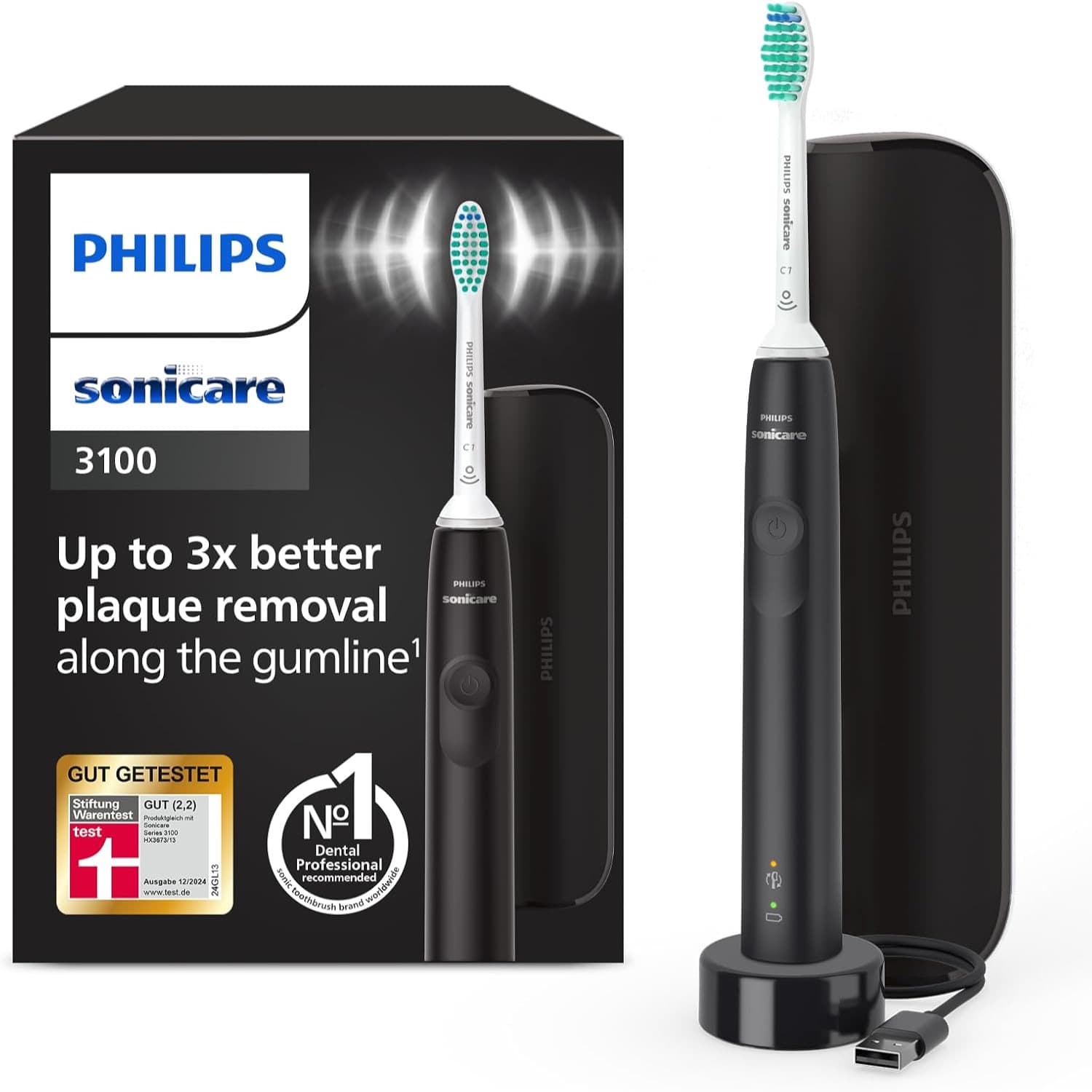 Schwarze Verpackung mit Philips-Sonicare-Logo und der Zahl 3100, daneben die schwarze Zahnbürste mit weißem Bürstenkopf, flachem Reiseetui und Ladeschale mit USB-Kabel