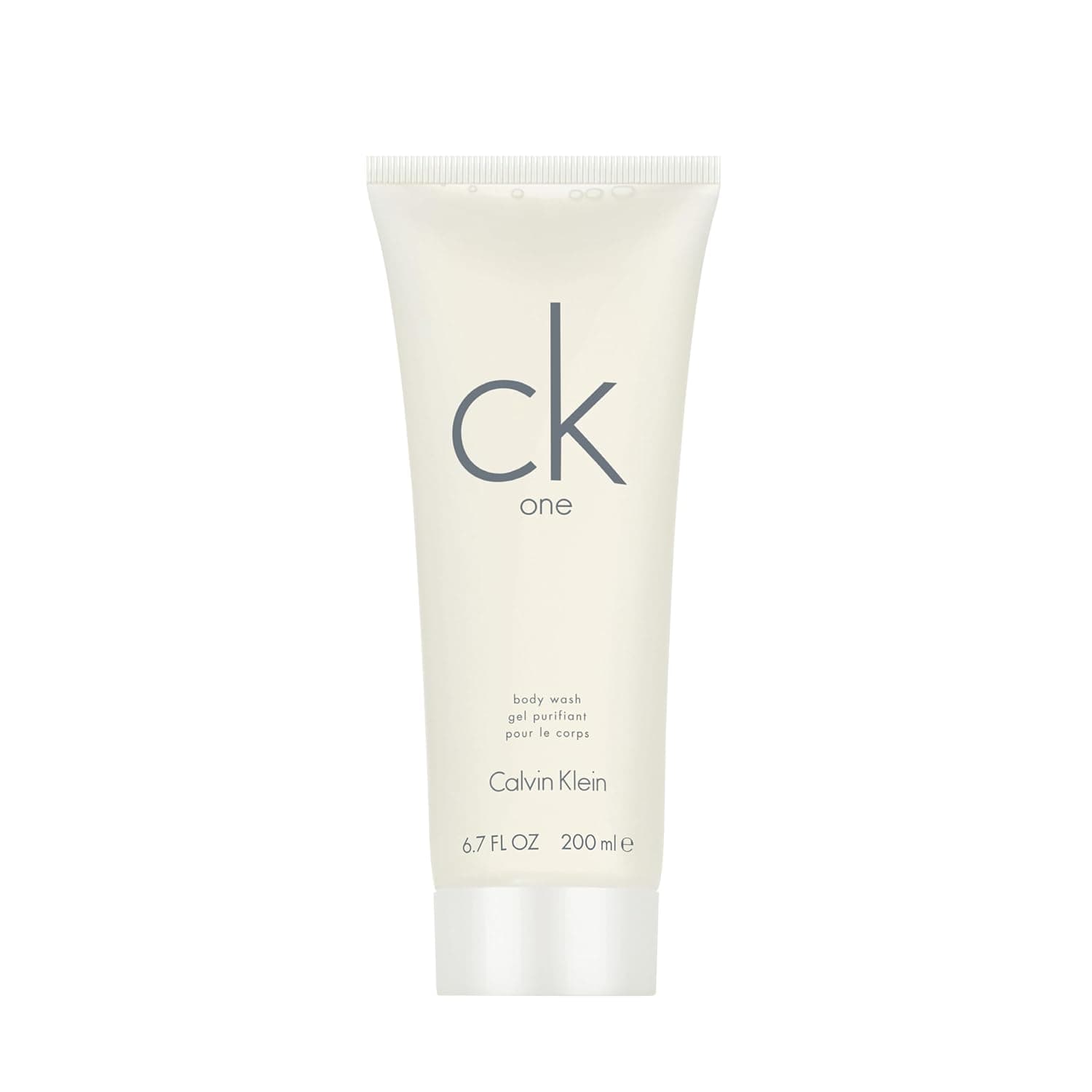 Cremeweiße Tube des Calvin Klein ck one Hair and Body Wash mit grauer Aufschrift und weißem Schraubdeckel, 200 Milliliter
