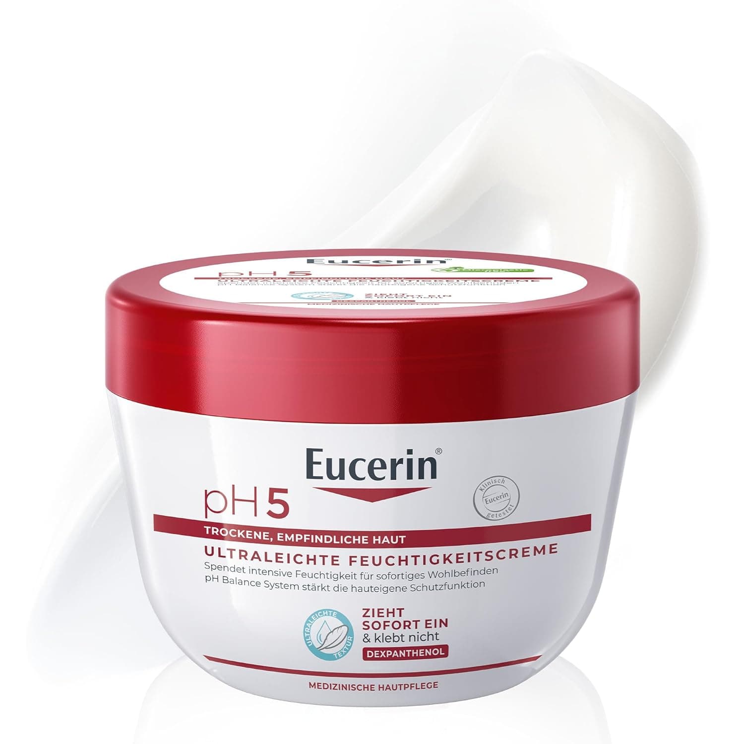 Weißer Tiegel Eucerin pH5 mit rotem Deckel und der Aufschrift Ultraleichte Feuchtigkeitscreme, dahinter ein Klecks weiße Creme