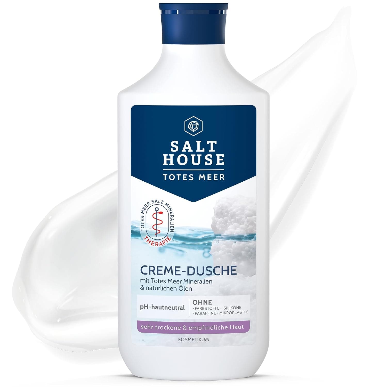 Weiße Salthouse Flasche Totes Meer Creme-Dusche mit dunkelblauem Etikett vor einem cremefarbenen Tupfer