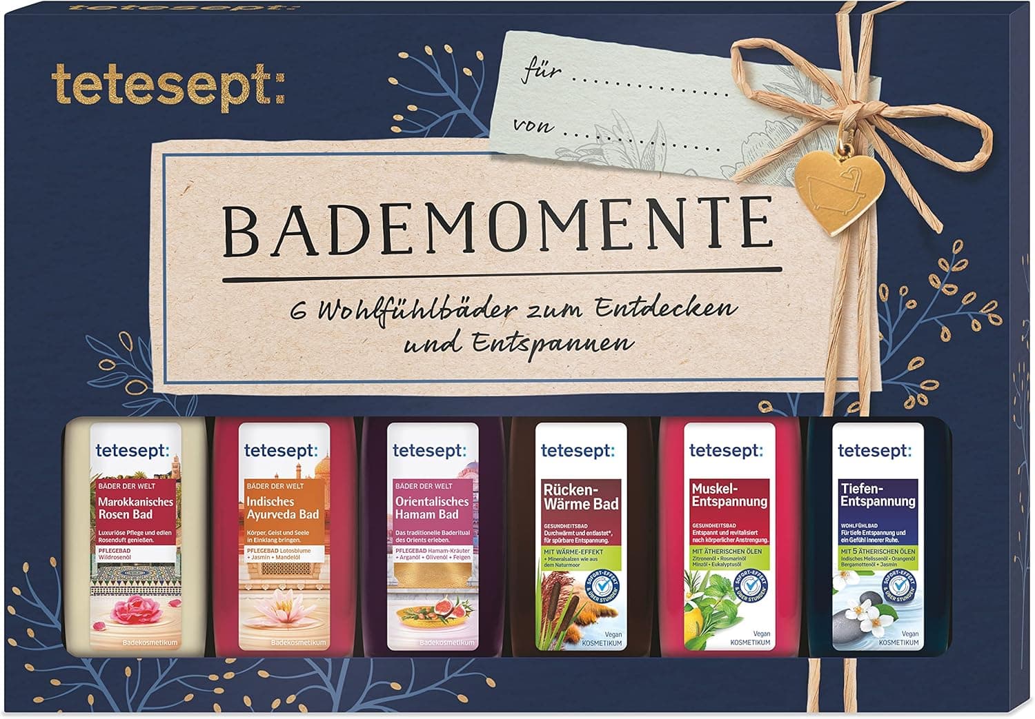 Dunkelblaue tetesept Geschenkschachtel Bademomente mit Schleife und Geschenkanhänger, davor sechs kleine Fläschchen mit unterschiedlichen Badezusätzen